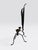 Minimalist vintage black forged wrought iron and copper candleholders. The sleek tall pair also has carving details on the...
