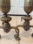 The pair features curved, scroll-style legs with lion's paw feet and a fluted urn-and-column design Ornate fronts are...