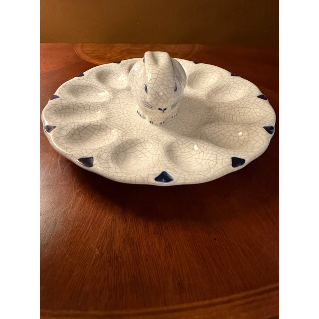 The Vintage Potting Shed Dedham Bunny Deviled Egg Platter is a charming 8.5" ceramic piece originating from England in the...
