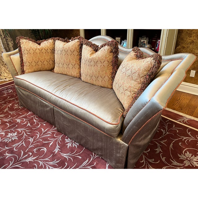 This Century Furniture Scalloped High Back Sofa is a statement piece that combines comfort with classic luxury. It...