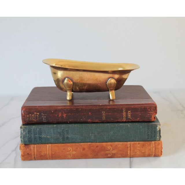 Vintage decorative bass bathtub. Could serve as a soap dish. Made in Taiwan. Patina.