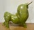 Monumental abstract bronze bull sculpture with green patina, inspired by the iconic rounded forms associated with Fernando...