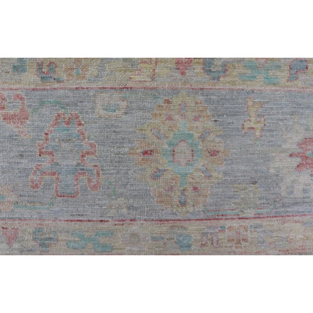 Modern Oushak Floral Motif Design in Light Green Background and Colorful Design For Sale - Image 4 of 12