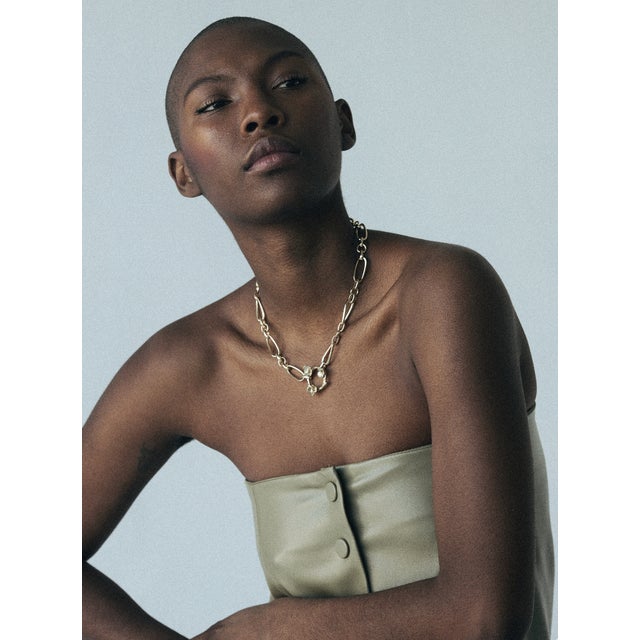 The Carmine Chain Collar is a perfect statement piece for this season. What makes this piece so unique is the Hand-carved...