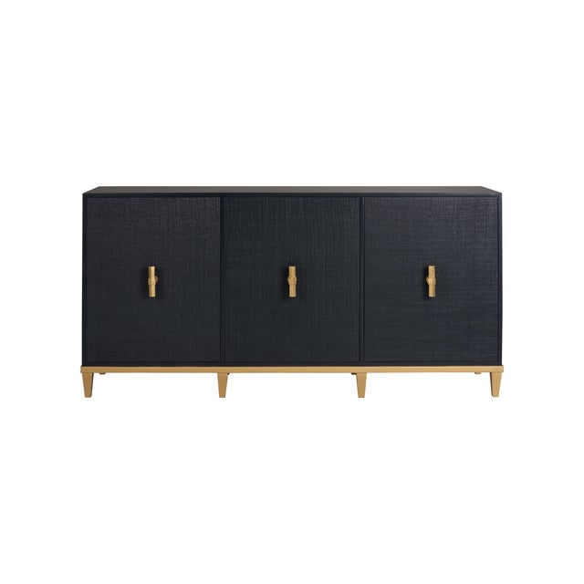Wood console with raffia covered doors, two shelves and gold leaf finished hardware. Not intended for clothing storage....