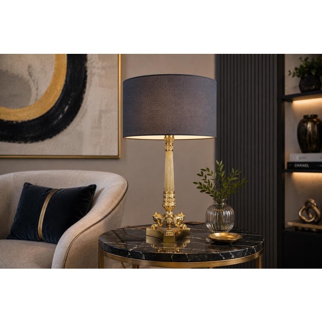 A striking vintage art deco / machine age table lamp featuring a frosted glass globe shade set above a streamlined metal...