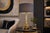 A striking vintage art deco / machine age table lamp featuring a frosted glass globe shade set above a streamlined metal...