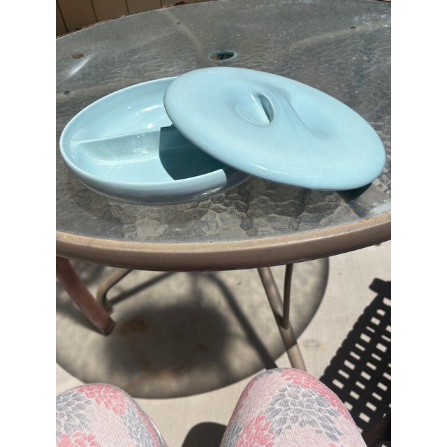 Russel Wright Light Blue Iroquois Divided Casserole Dish with Pinch Lid and was made by Russel Wright from 1949-1967. This...
