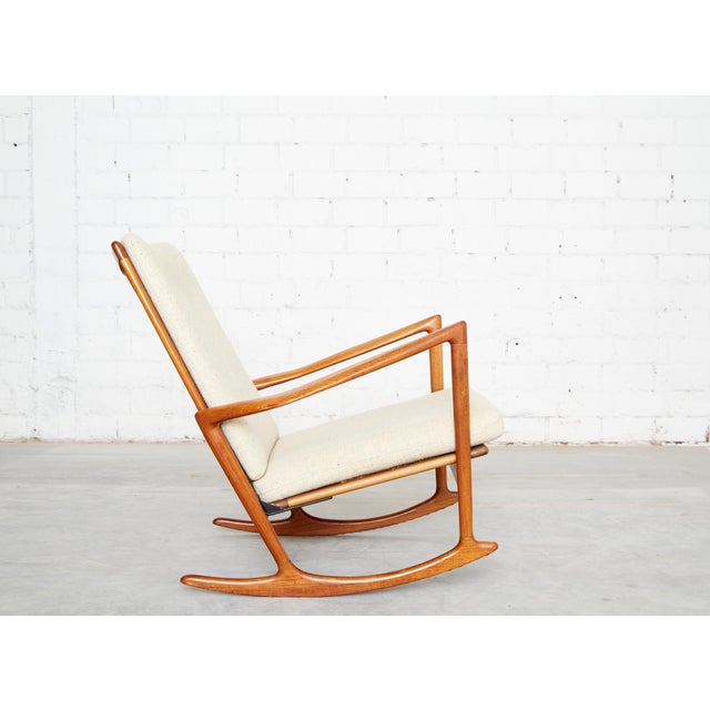 Ib Kofod Larsen was a Danish architect and furniture designer. After studying architecture at the Royal Danish Academy in...