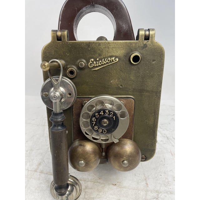 Beautiful Ericsson wall-mounted Edge telephone, made of Bronze with Solid Walnut Base (approximately 15Kg), ready to hang....