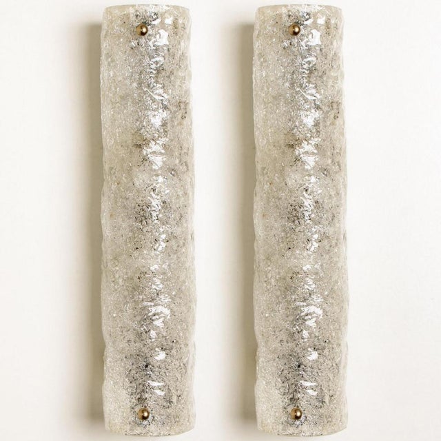 Clean lines to complement all decors. Wonderful high-end wall light fixtures with brass detail and thick bubbled blown ice...