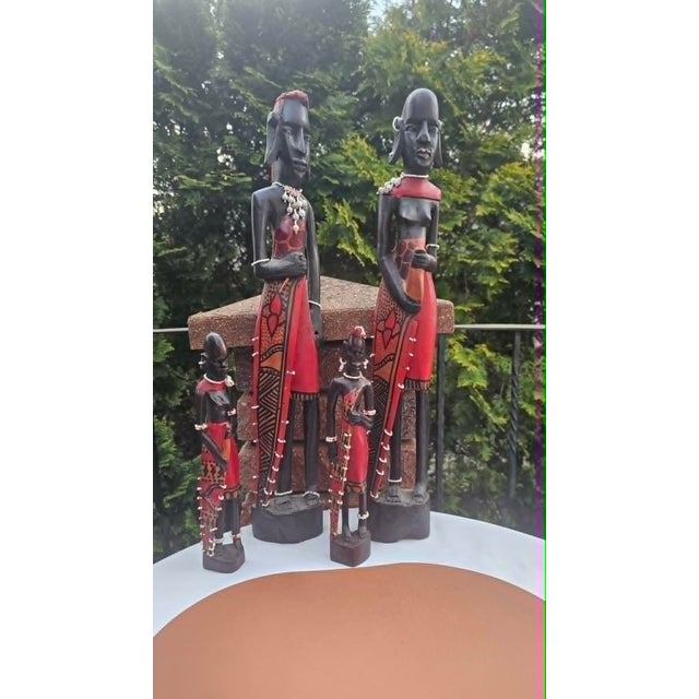 Masai Wooden Sculpture, 1960s, family, price for 4 pieces, dimensions: height 61 cm, width 8.8 cm, depth 7 cm.