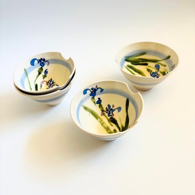 A set of 4 vintage studio pottery noodle bowls. Each has two grooves formed into the rims for holding chopsticks. Lovely...