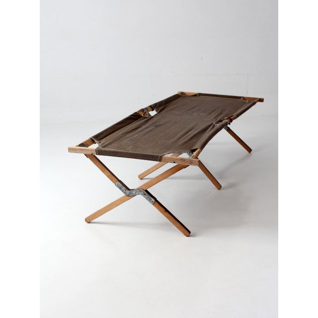 Vintage Byer Manufacturing folding camp cot with the clean utility and understated character of classic campaign...