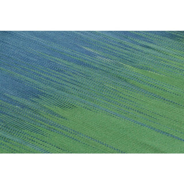 Handwoven in wool, a 7x9 Kilim is from an inventive new contemporary flat weave collection by Rug & Kilim. On the Design:...