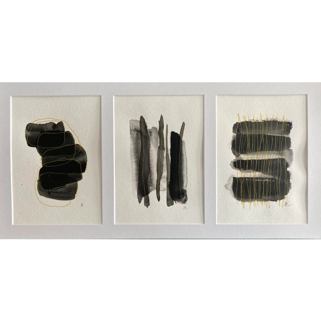 "Triptych" Three small original black and white abstract paintings. Ink, pencil and gold pen on paper. Signed and framed.