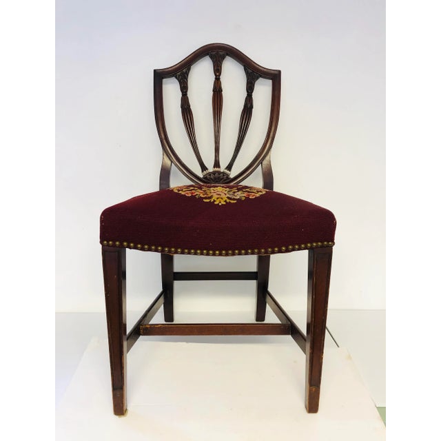Vintage mahogany needlepoint side chair, 1939 signed needlepoint. Lower stretcher repair shown