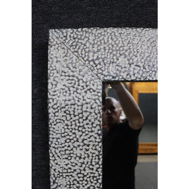 Reclaimed "Pebbles" wall mirror by Olde Good Things, New York City. The frame is crafted from reclaimed zinc with a...