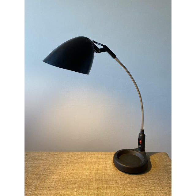 Italian Randa Z1550 adjustable desk lamp manufactured by Veneta Lumi in the 1980s. The lamp features a distinctive...