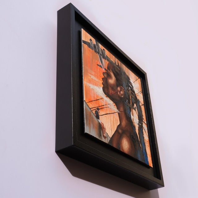 This artwork presents a striking profile of a woman against a backdrop of vibrant orange tones and abstract elements,...