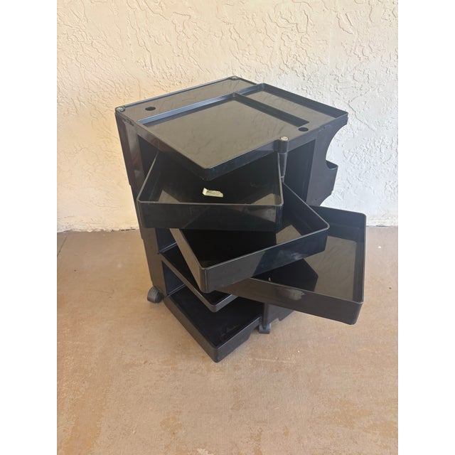 An early version of Joe Colombo’s iconic Boby trolley, signed in the molded plastic. Its modular form combines tiered...