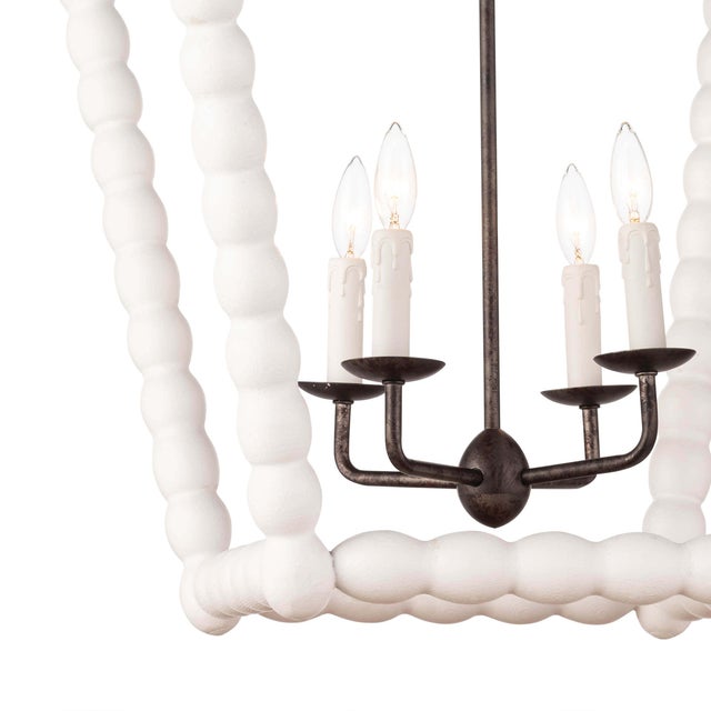 The Perennial birch wood lantern features a beautifully hand-carved outer frame that forms an open-air silhouette. An...
