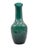 This distinctive glass vase captivates with its intense aquamarine hue and gentle color gradient from dark turquoise at...