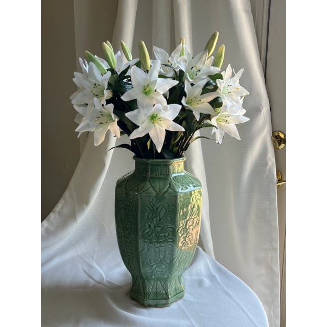Vintage c1970s Chinese Export Celadon vase. This beautiful light green vase features 8 sides, embossed floral design, and...