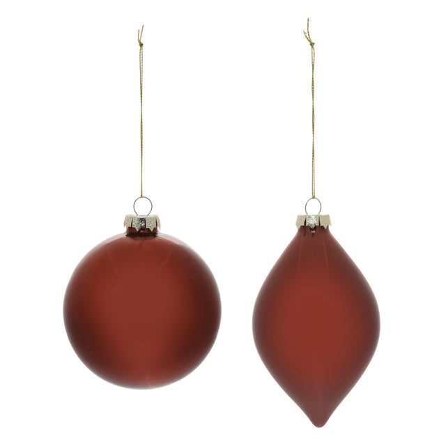 Bring a festive touch to your holiday decor with this exquisite set of Red Glass Ball Ornaments. This collection of...