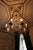 Figural 2-Tiered 12-Armed Chandelier For Sale - Image 6 of 7