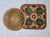 A pair of boho trivets, likely from the 1970s. One is round and measures 7” diameter x ½”. The square one is 8” sq x ½”....