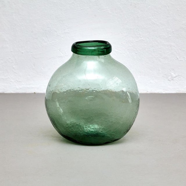 Early 20th centry Spanish glass bottle vase. Manufactured in Spain, circa 1940. In original condition with minor wear...