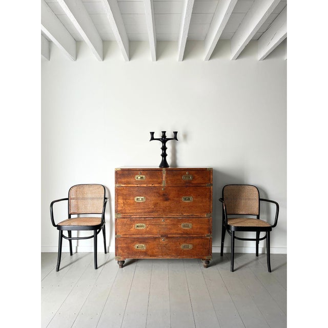 A brass bound military campaign chest of drawers. This antique mahogany dresser has two short drawers over three long...