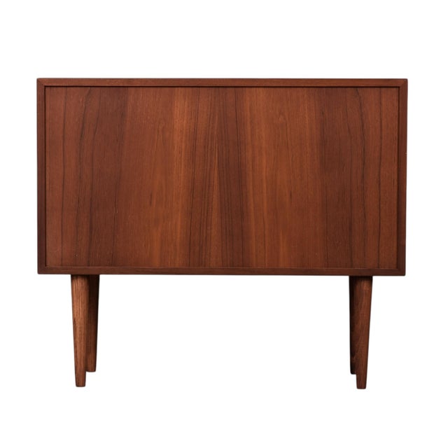 Restored early Danish Modern petite bookshelf by Lyby. This shelf is adjustable height and removable. The back sides are...