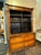 The Pair of French Empire Walnut Display Cabinets is a set of antique furniture pieces that exude elegance and...