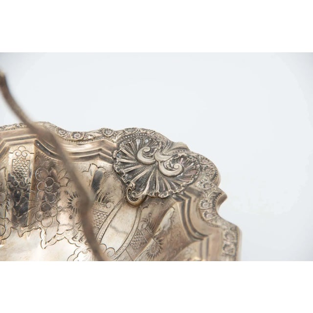 Silver Fruit Bowl with Chiseled Engravings, in Very Good conditions. Designed 1890 to 1919 This piece has an attribution...