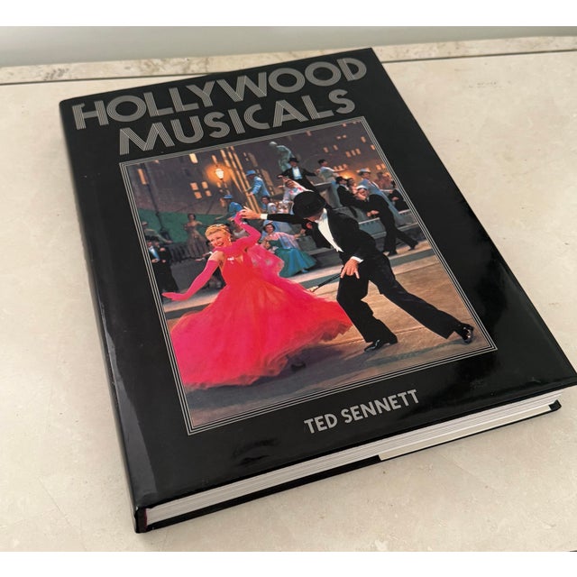 Large and beautiful 1985 Hollywood Musicals book by Ted Sennet, a leading voice in the performing arts world. “A joyous...