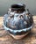 This avant-garde studio pottery urn is a striking fusion of Brutalist form and masterful glaze application. The globular...