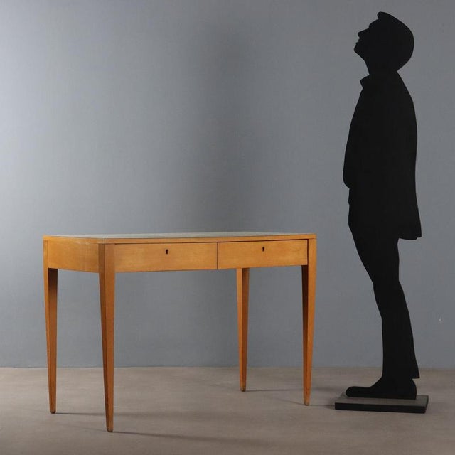 Vintage 20th-century Italian-made beech wood writing desk with two drawers and a yellow Formica top. This piece is...