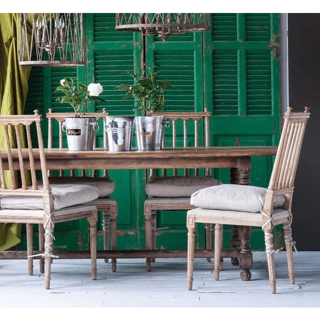The craftsmanship is immediately evident with the slat-back Barnaby Chairs. Made of hand-crafted-pine wood and a natural...