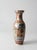 Vintage Chinese porcelain vase featuring colorful Famille Rose style decoration with birds, peonies, flowering branches,...