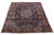 This vintage Kashan hand-knotted wool rug has a navy blue field and multicolor accents throughout the design. This rug...