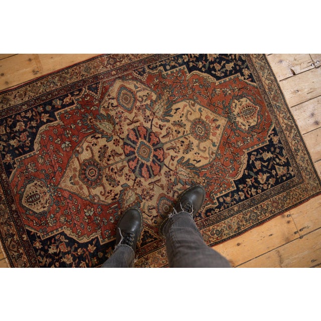 :: Large scale shield-like center medallion with outwardly directed intricate floral blossoms and splayed palmettes atop a...