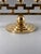 An exceptional Swedish brass candelabra by renowned metalsmith and designer Lars Holmström (1894–1959), produced at his...