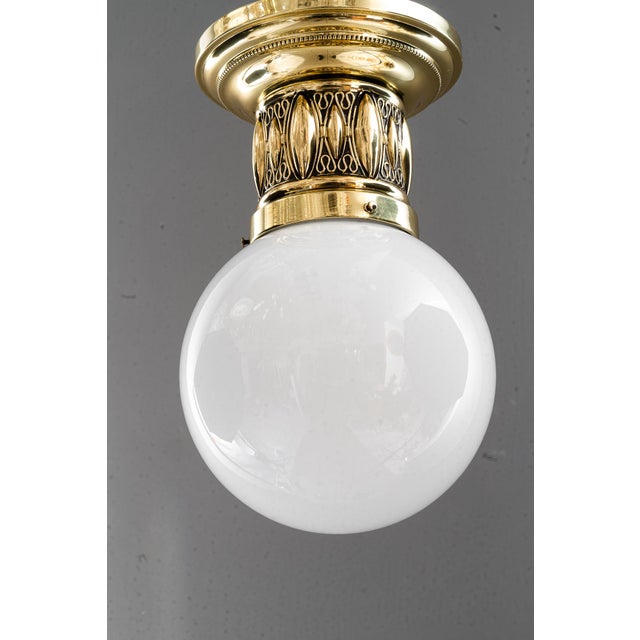 Art Deco ceiling lamp with original opal glass shade vienna around 1920s Up to 250V (Europe/UK Standard).The wiring of...