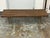 Design Plus Gallery presents a Vintage Mid-Century Modern Slatted Walnut Bench / Coffee Table. A long rectangular profile...