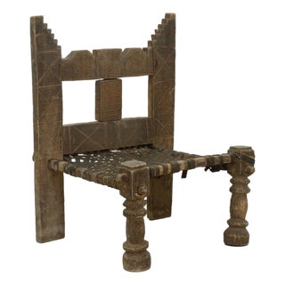 Early 20th Century Carved Wood + Woven Leather Chair For Sale