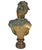 Decorative patinated plaster bust of an elegant young woman modeled with her hair arranged in an elaborate updo adorned...