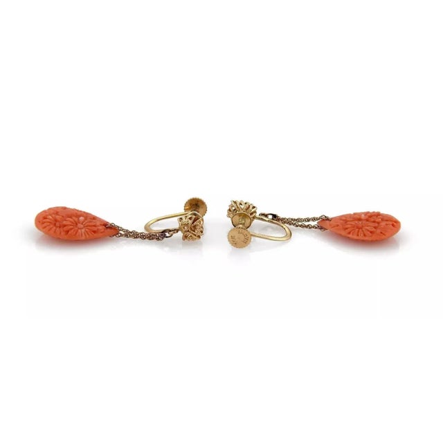Material: 14k yellow gold Hallmark: Naomi 14k Measurement: 1.47" long x 0.51" wide x 0.19" high Gemstone: Coral 0.73" long...