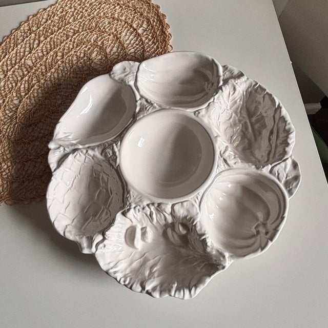 A beautifully sculptural Portuguese majolica serving platter by Faianças Neto & Gomes, featuring an abundant harvest motif...